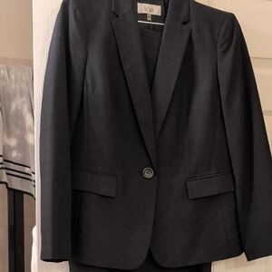 Le Suit Women's Black Skirt Suit. Thin Blue Pinstripe.